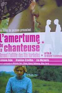 Главный постер фильма «L'amertume de la chanteuse devant l'utilité des fils barbelés (2002)»