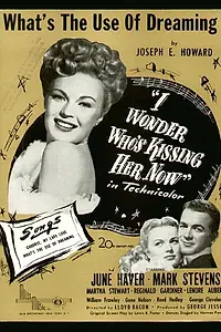 Главный постер фильма «I Wonder Who's Kissing Her Now (1947)»